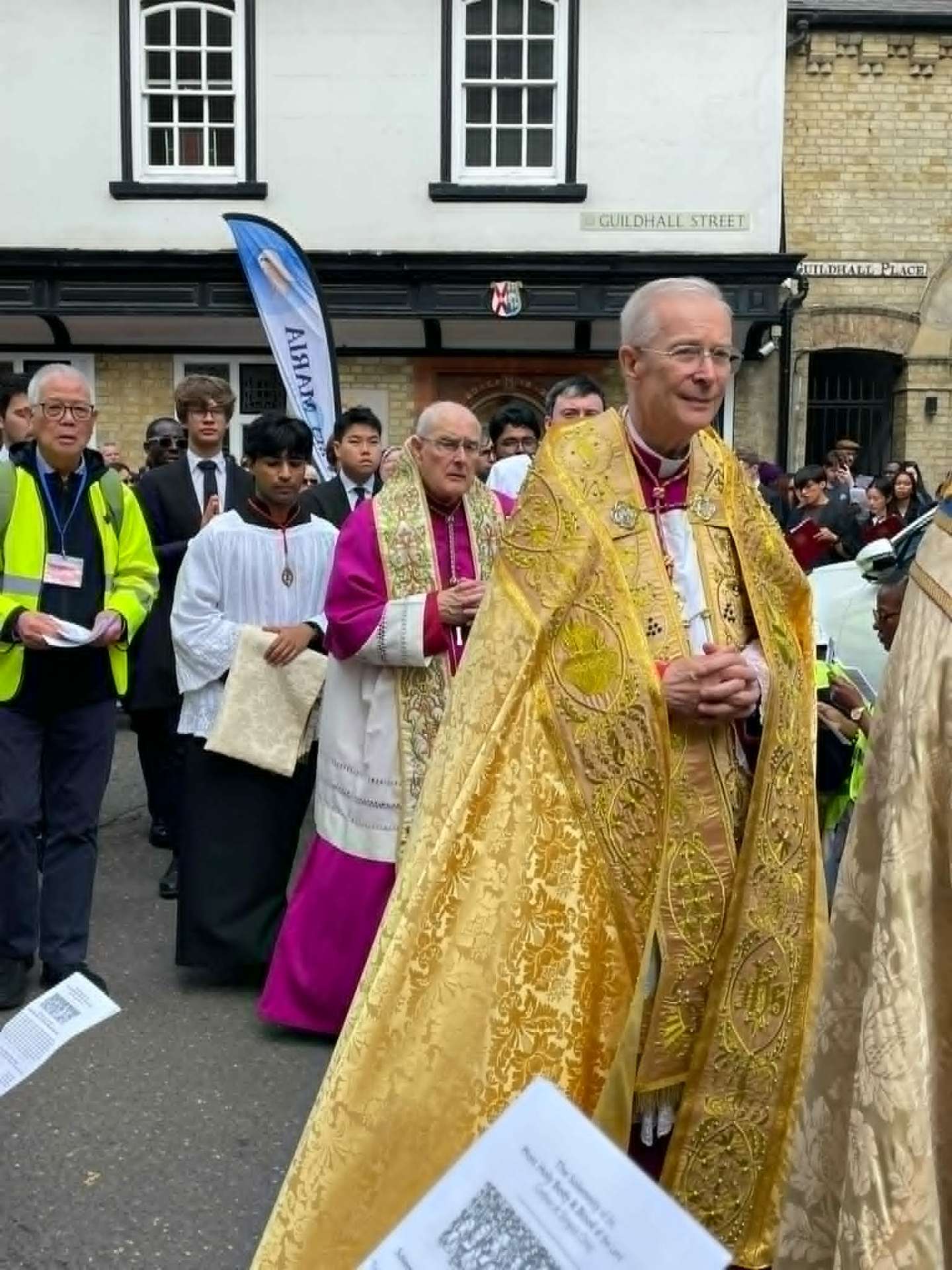 A Corpus Christi Procession is taking place in Cambridge, England.