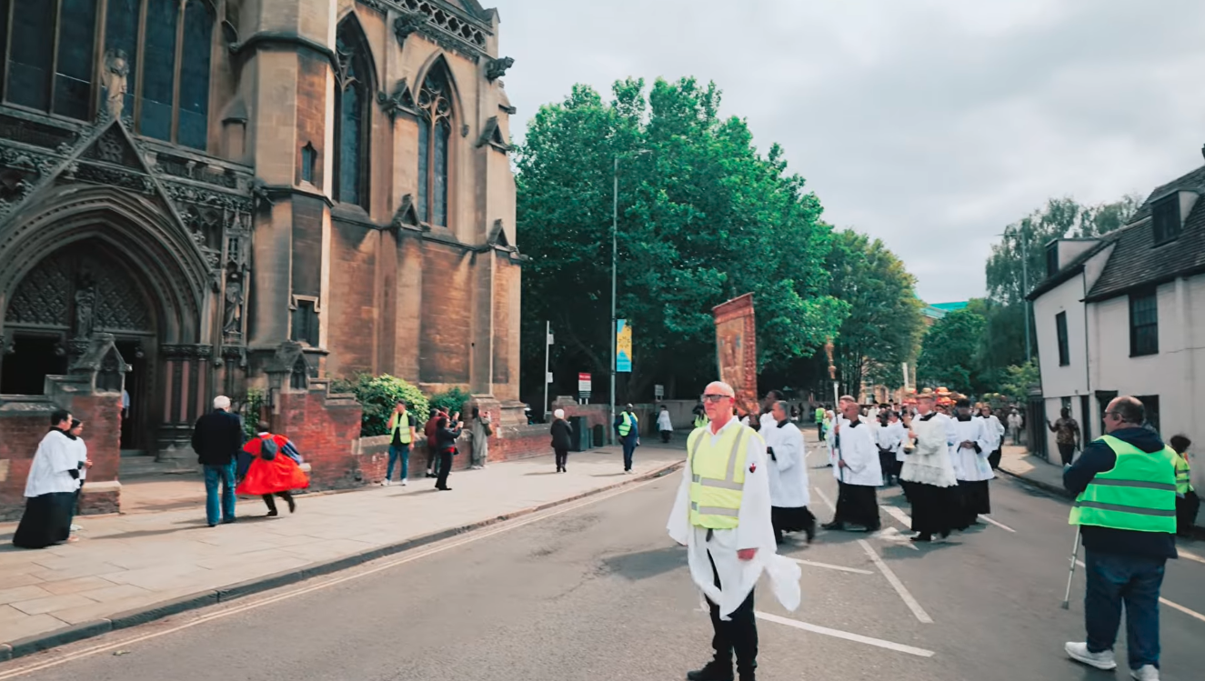 A Corpus Christi Procession is taking place in Cambridge, England.